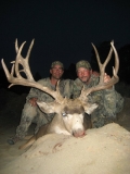 Royce Olney and Rob Degner with John Blackburn's 235 inch Northern NM Mule Deer.