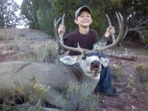 Christopher Sanchez on his first hunt with his first buck. One shot, one kill.