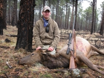 Canyon Young with the cow elk he harvested in the Valle Vidal during the November hunt.