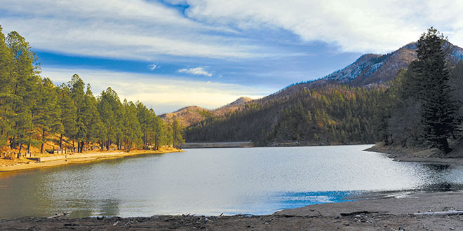 Bonito Lake, a popular trout fishing lake near Ruidoso, closed in 2012 after the Little Bear Fire. Reclammation work is scheduled to begin this fall. Photo by Karl Moffat, New Mexico Wildlife magazine, NMDGF.