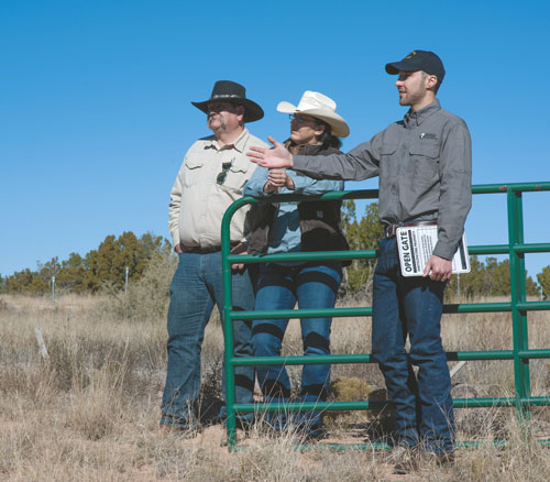 Ryan Darr, the Game and Fish lands program manager, examines an area now accessible to sportsmen and women as a result of the Open Gate program. Photo by Martin Perea, New Mexico Wildlife magazine, NMDGF.