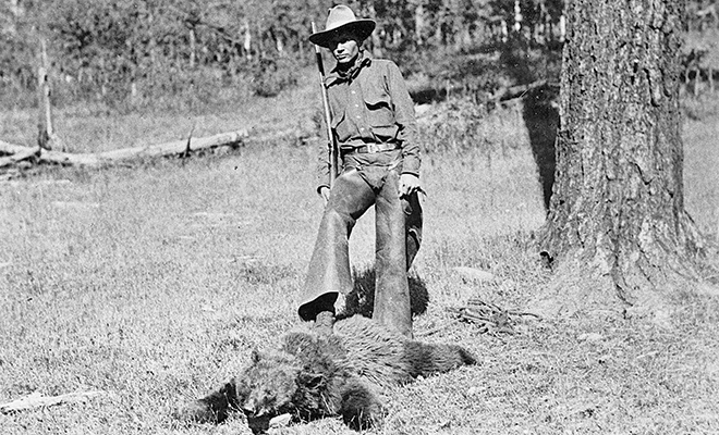 Unidentified bear hunter, date unknown. Photo: Unknown. (Making Tracks: A Century of Wildlife Management. New Mexico Wildlife magazine. (A history of the New Mexico Department of Game and Fish, NMDGF).