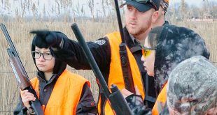 Lobato guides hunter education graduates on a youth pheasant hunt he organized. -NMDGF